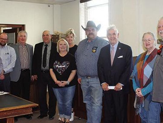 Congressman Williams speaks with County Officials