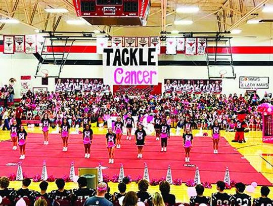 Eastland Cheer Says ‘Let’s Tackle Cancer!’