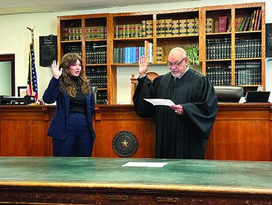 Judge Hullum swears in new Attorney Erin Mayes