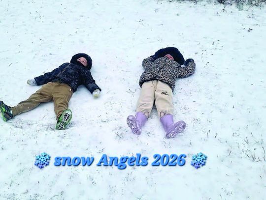 Kids making snow angels in this winter weather
