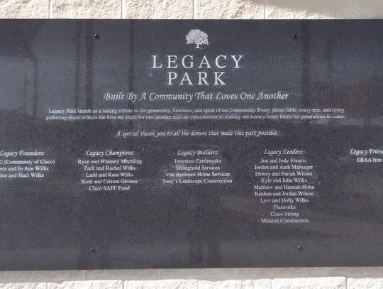 The sign at LEGACY PARK says--Built By A Community That Loves One Another
