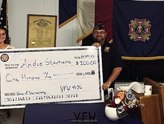 VFW Post 4136 Commander presents Check to Essay Contest Winner